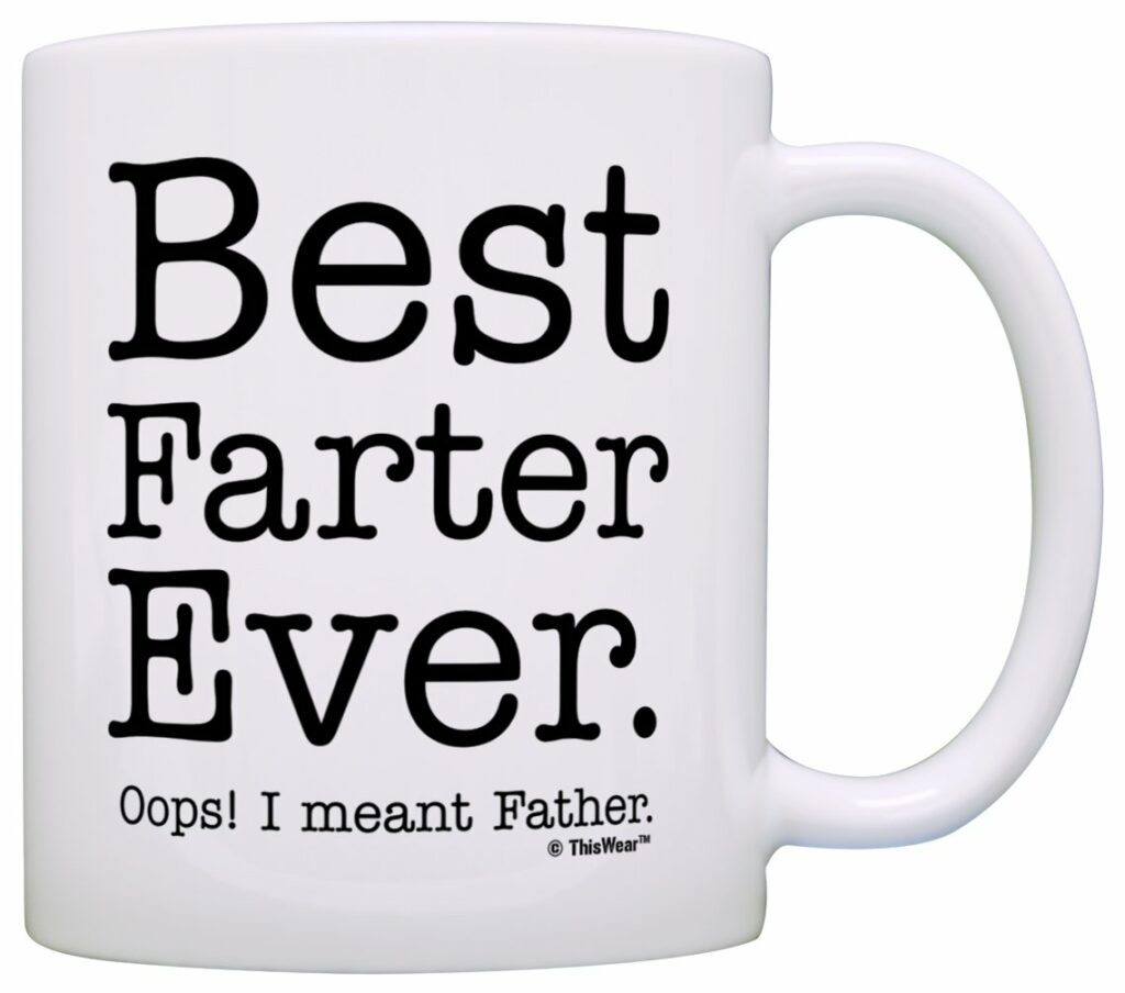 White mug reading: "Best Farter Ever." and then "Oops! I meant Father." with a little logo at the bottom reading "ThisWeek (trademarked)"