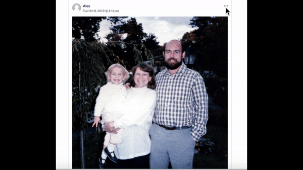 Animated GIF showing a photo of two parents and their daughter, the user adding a caption and then repositioning it to the bottom.