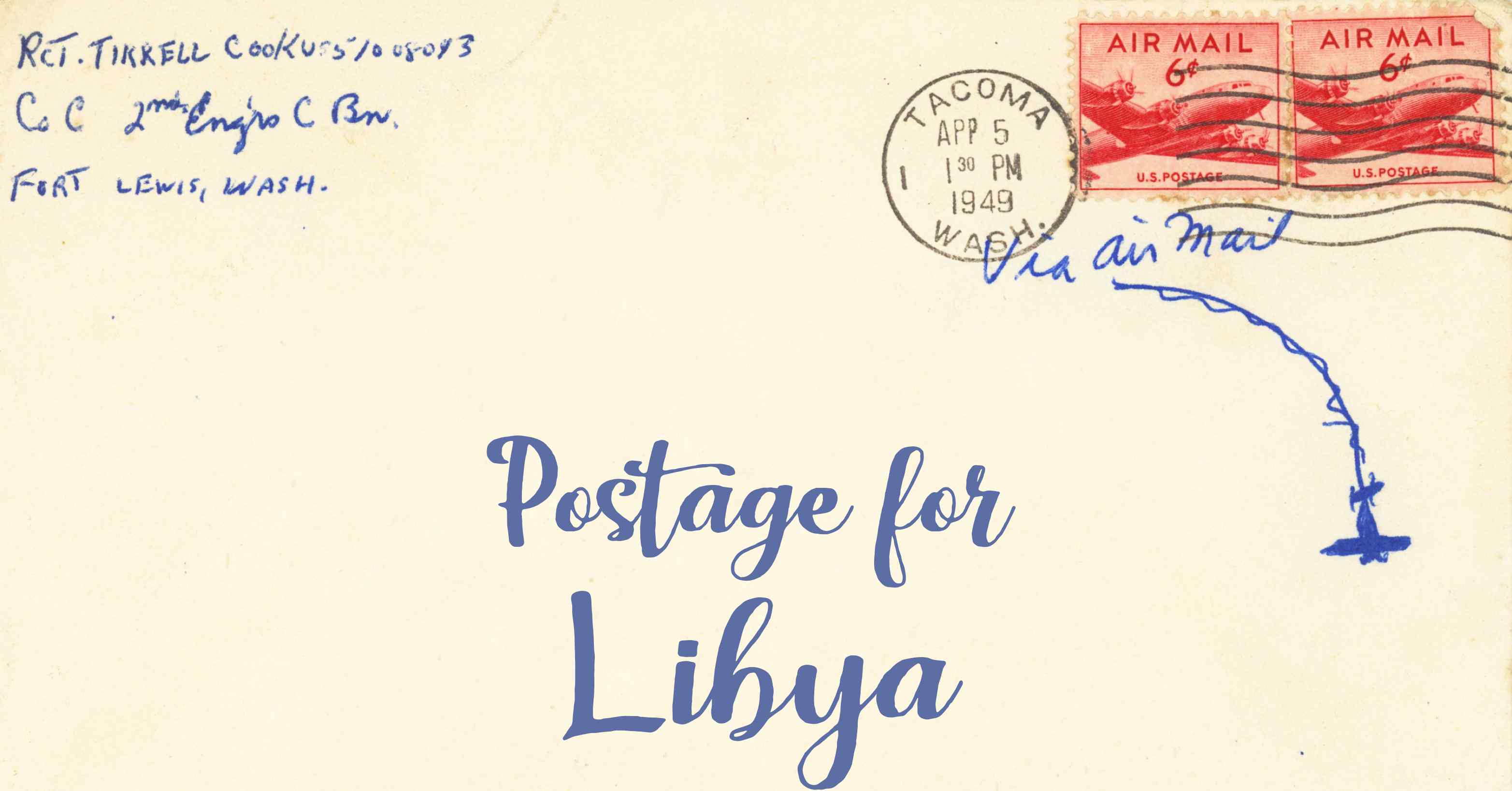 Photo of an old envelope reading 'Postage for Libya'