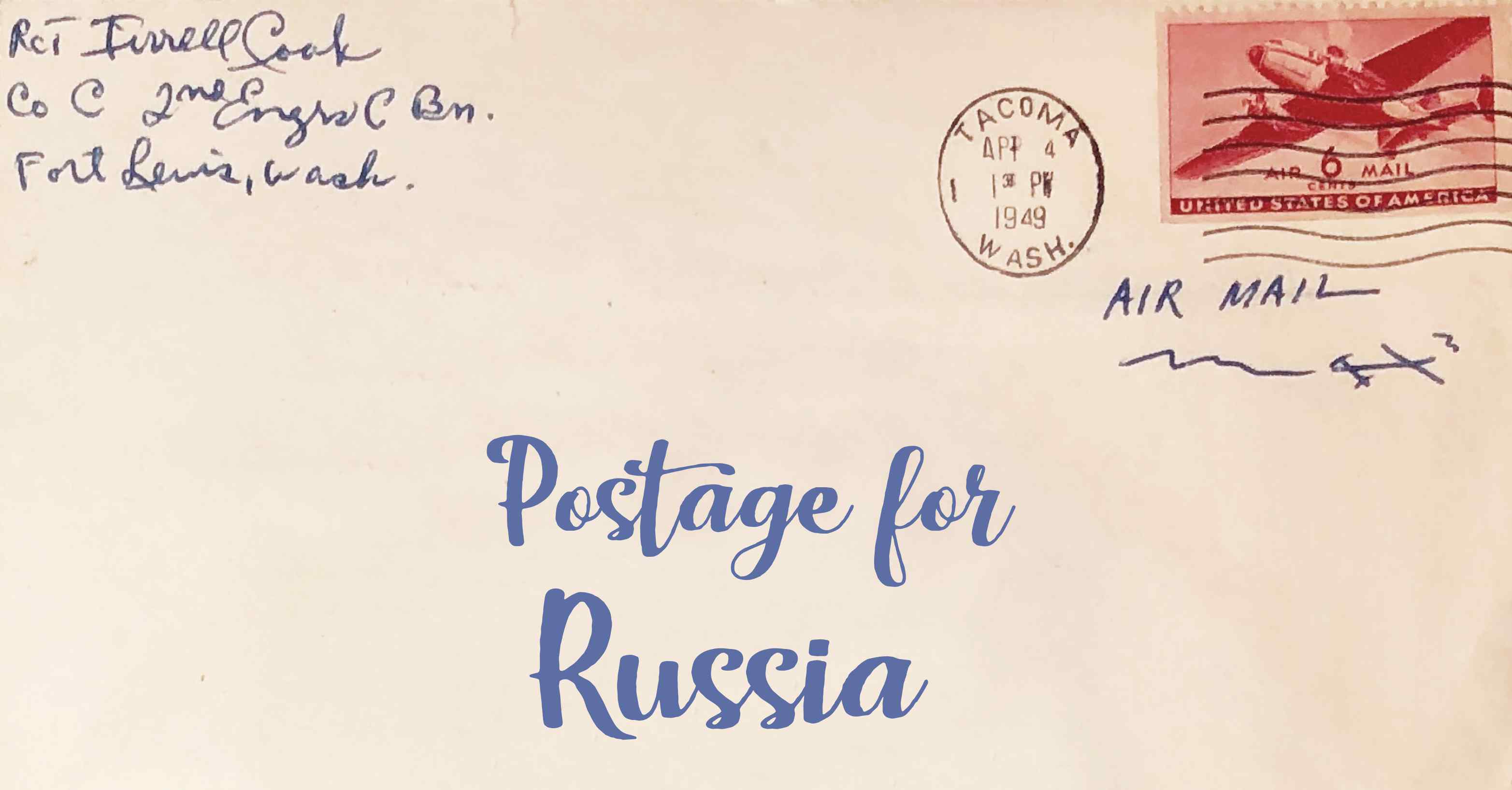 Photo of an old envelope reading 'Postage for Russia'