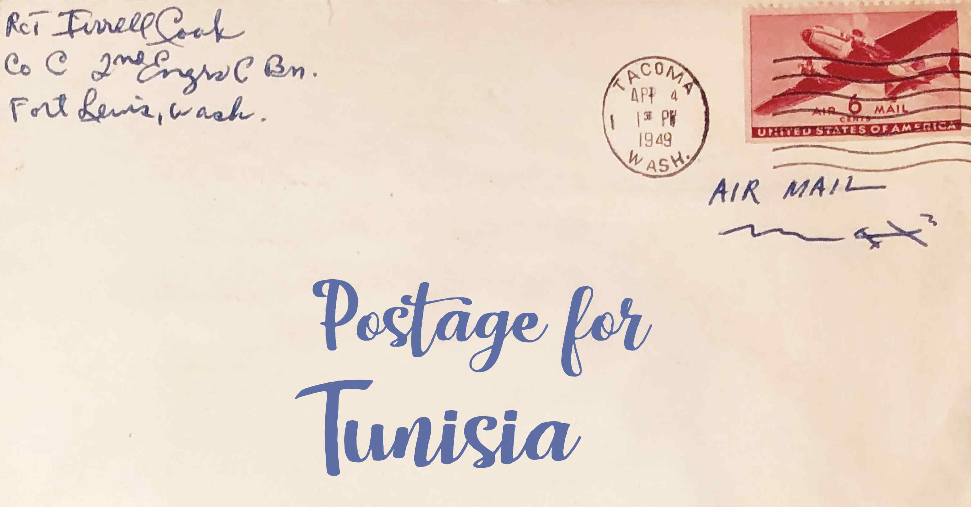 Photo of an old envelope reading 'Postage for Tunisia'