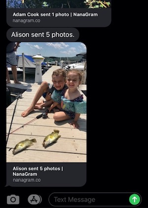 iPhone screen shot showing an assigned contact, 'Another photo of the same two kids who caught two big fish sitting on the dock and smiling.